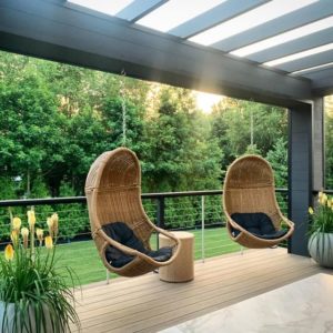 Outdoor patio with hanging chairs